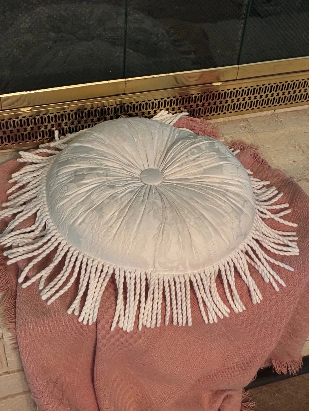 Round White accent Pillow with Twisted Fringe